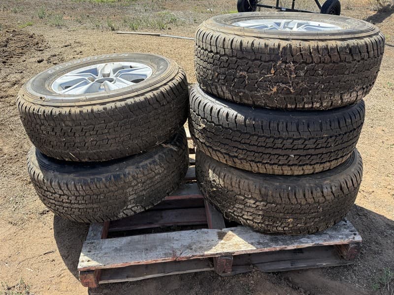 PALLET OF TYRES AND RIMS. 3 x Toyota 5 stud rims to suit 200 series Landcruiser. 5 x Grandtrek 285/65R17 tyres at 99%. Tyres pulled of vehic…