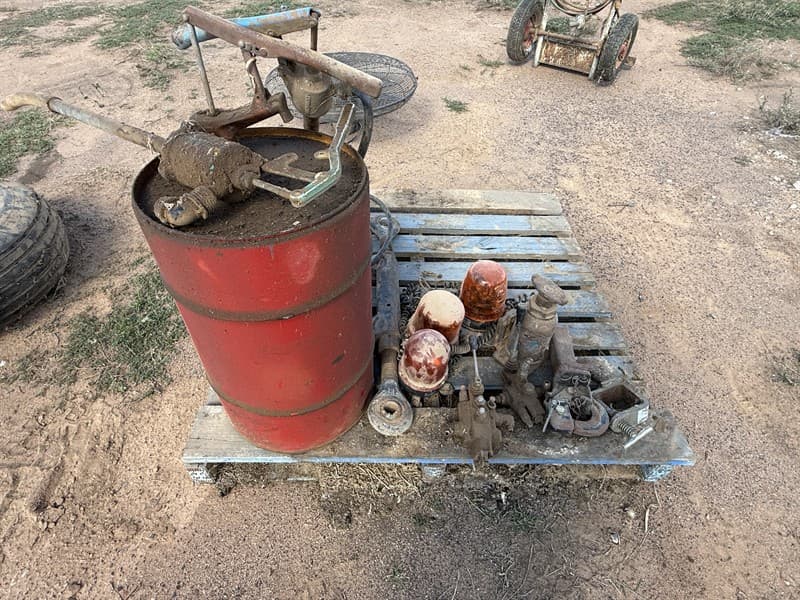 OIL DRUM PUMPS, BEACONS TOW HITCHES AND JACK. Also included is a linkage arm.