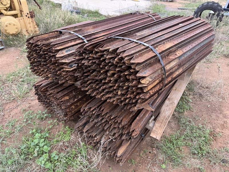 APPROX. 750 FENCE POSTS. Various lengths and hole orientation.