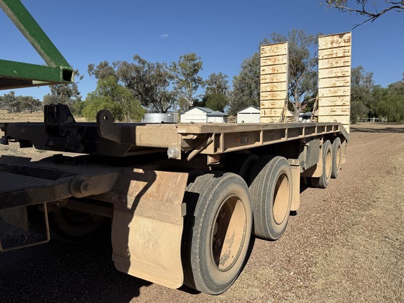 2000 HAULMARK PLANT TRAILER. VIN 6T9T24ABJY0ADM011. Quad axle. Spring suspension. Heavy duty ramps. Tyres 275/70R22.5 tyres. 6 metres flat d…