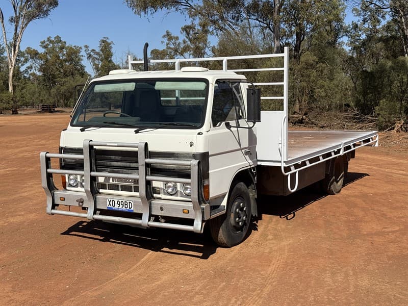1988 Mazda 4100 Tray Back Truck, VIN: WE17T-603876. Tray 5m x 2.44m, bull bar, large under tray toolbox, spare tyre, dual fuel tanks, 6 stud…