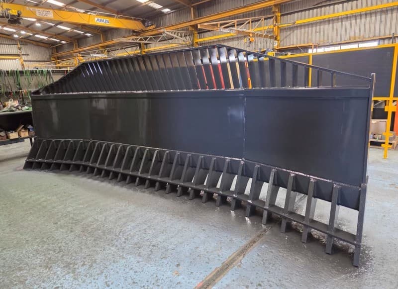 2026 UNUSED MCCORMACK INDUSTRIES STICK RAKE. Serial no. MC26-51219-1. 5500mm wide. To suit Caterpillar 980H loader. Located Nyngan, NSW