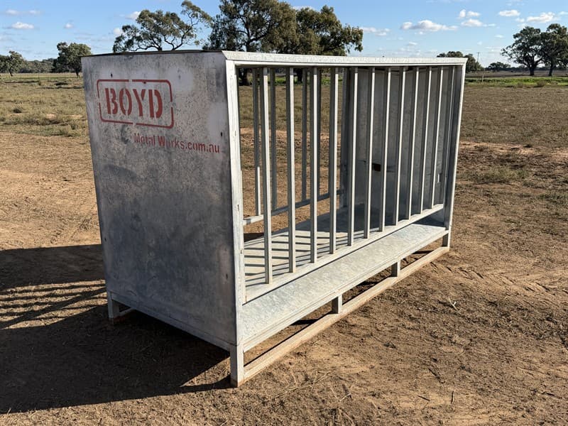 Boyd Metalworks enclosed large square bale hay feeder. Unused condition. Located Hay, NSW.