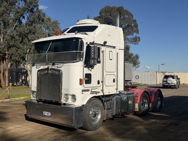 2002 KENWORTH 104. VIN: 6F50000002A423011. Showing 396452km, Series 60 Detroit engine #06R0684012. on Spicer diffs 4.11 ratio. Kenworth 8 ba…