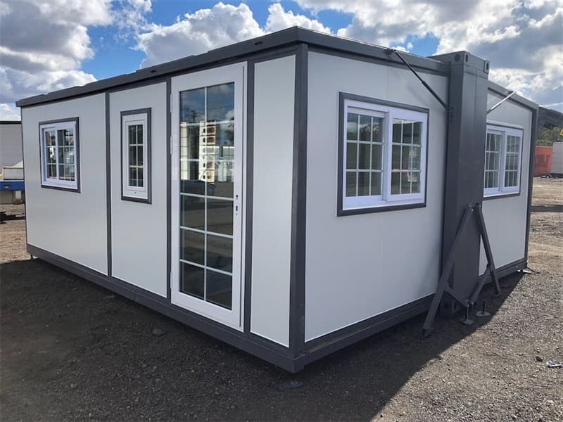 Unused Portable Foldout House, Model: 0207, Includes: 8 Sliding lockable Windows, 1 x Door, Timber look flooring, Gas struts & winches for e…